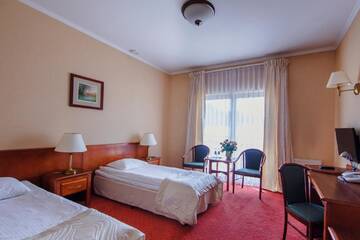 Фото номера Стандартный двухместный номер с 2 отдельными кроватями Отель Hotel Magellan г. Bronisławów 2